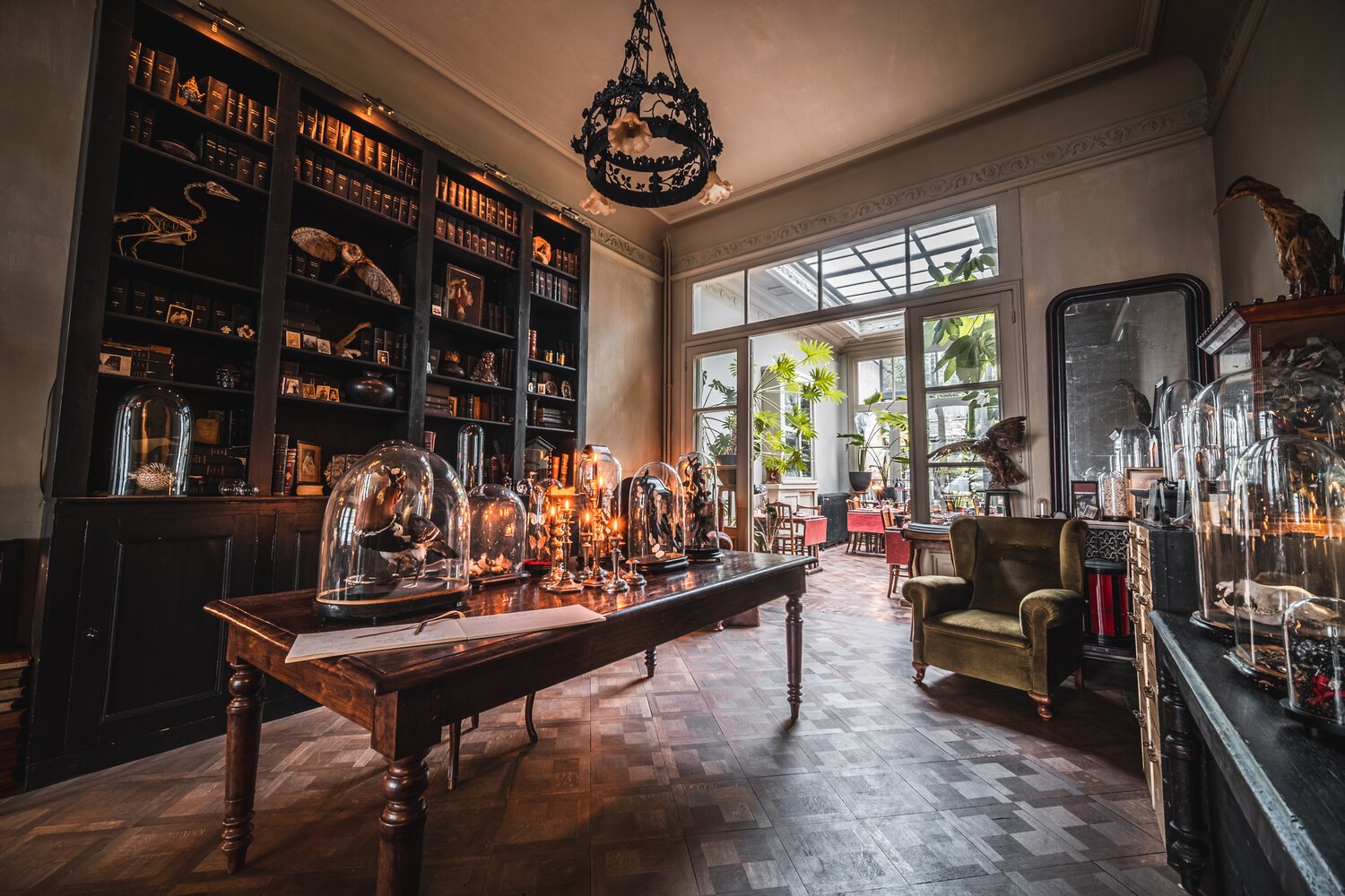 Antique-filled reception room at Boulevard Leopold Rooms and Suites