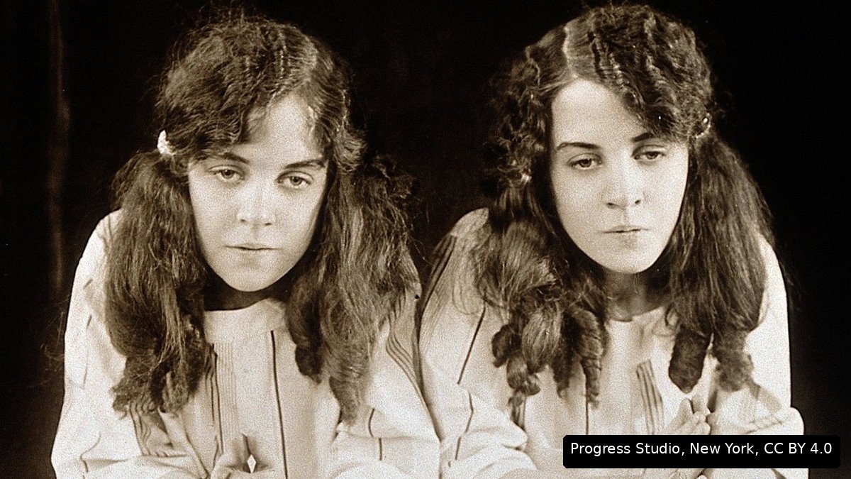 Sepia portrait of Daisy and Violet Hilton around 1927
