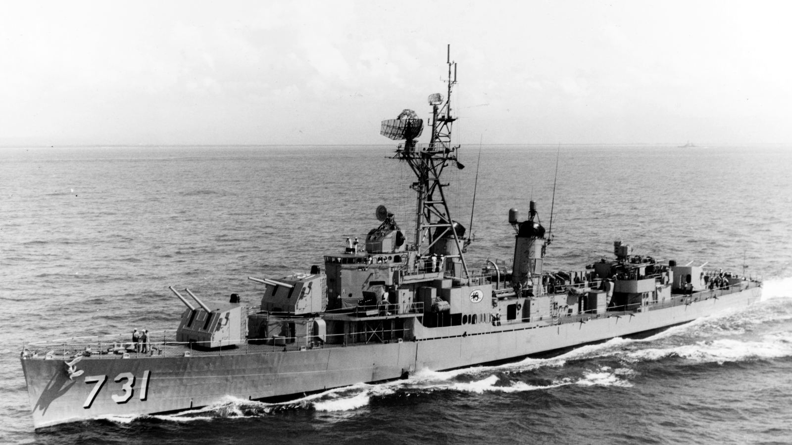 USS Maddox (DD-731) under way at sea, 1964