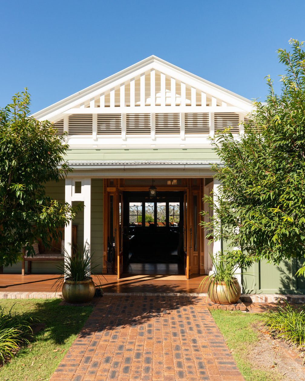 White Queenslander-style homestead entrance at Spicers Hidden Vale