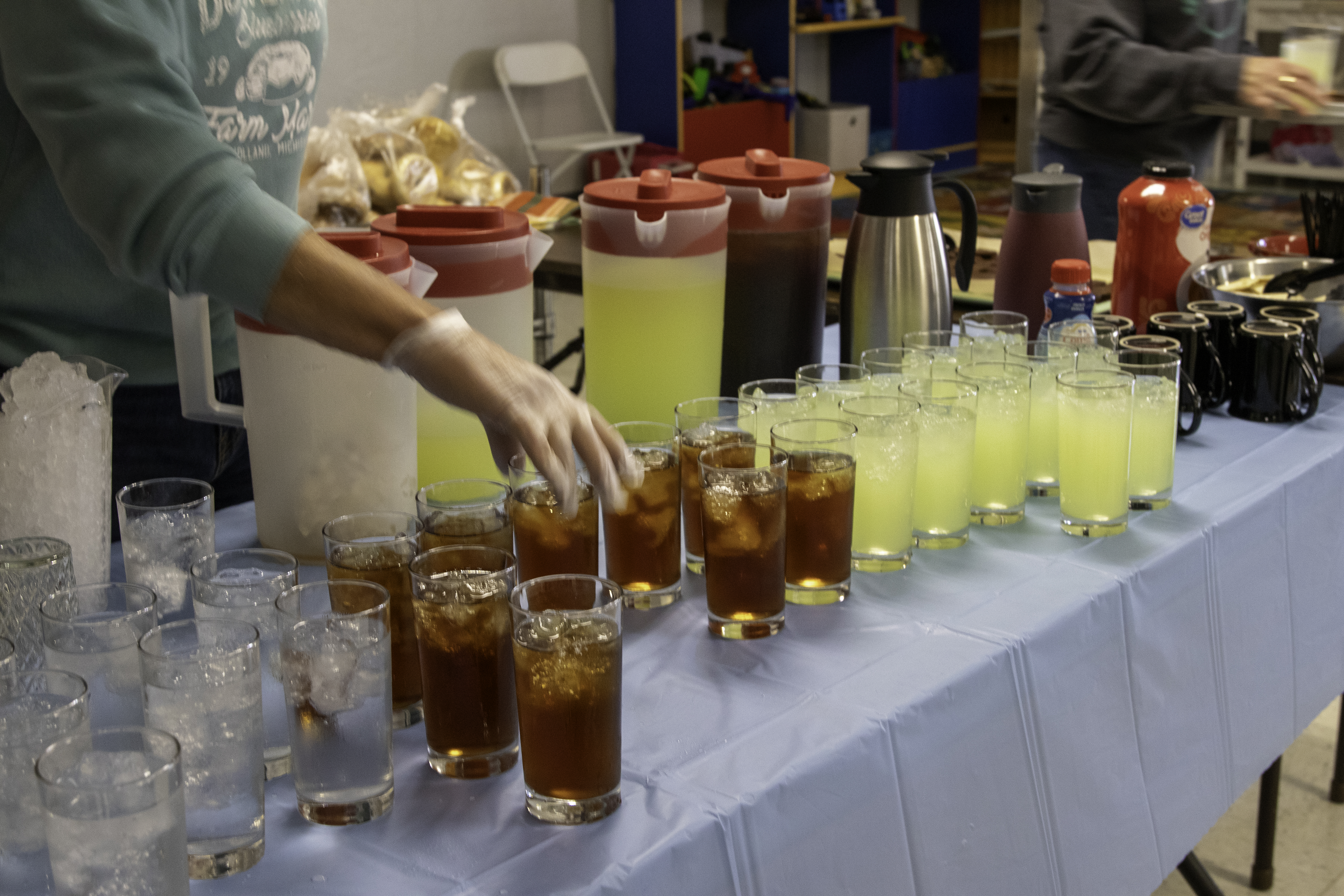 Volunteers serving a meal at The James II Project