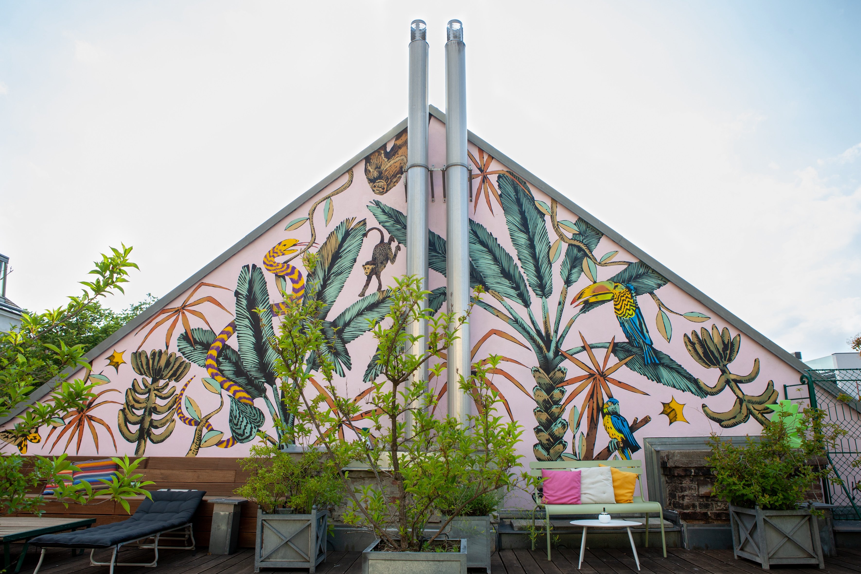 Rooftop terrace and painted mural at Hotel Altstadt Vienna