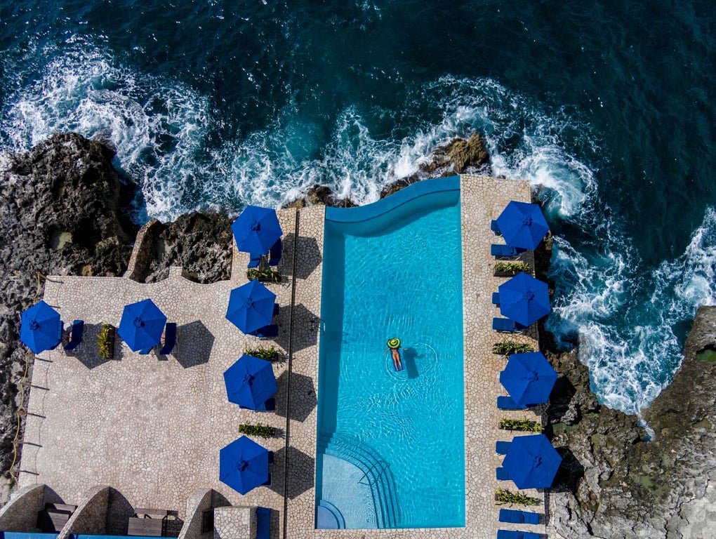 Cliffside swimming pool and Caribbean Sea at Rockhouse Hotel