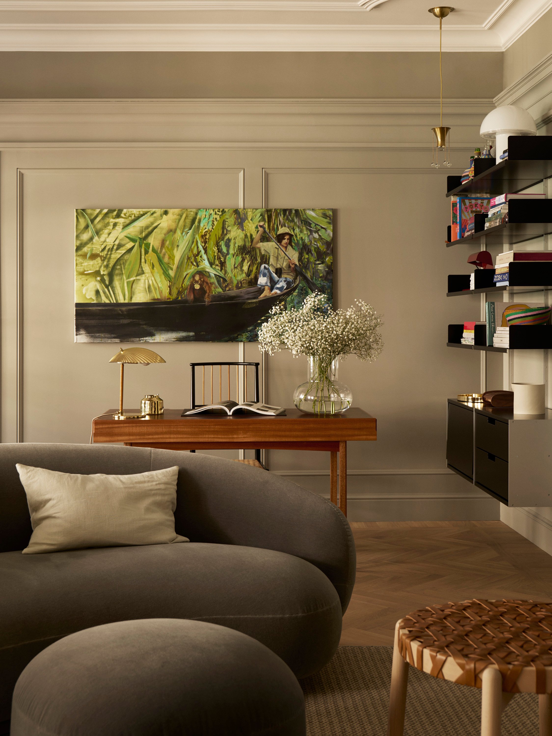 Comfortable living room with books and artwork at Ett Hem
