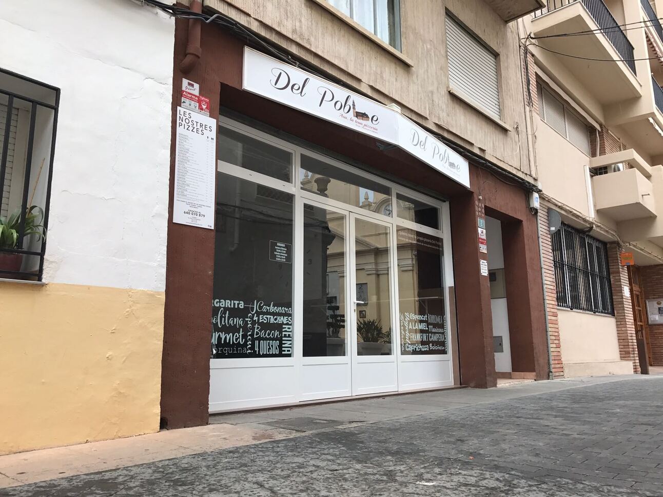 Portada de la edición Del Poble al món