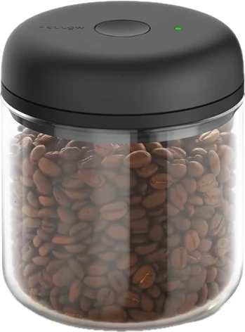 Fellow Atmos vacuum canister filled with coffee beans