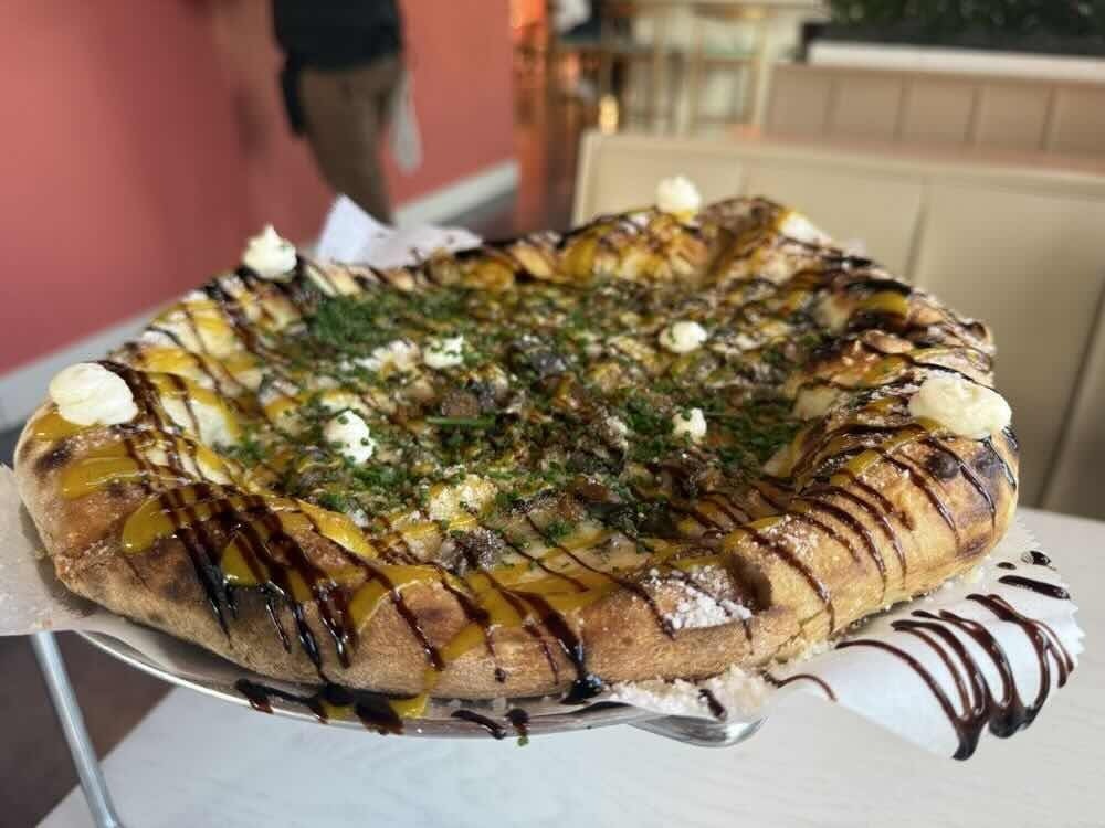 Canary Club pizza and mezze dishes in Bonita Springs