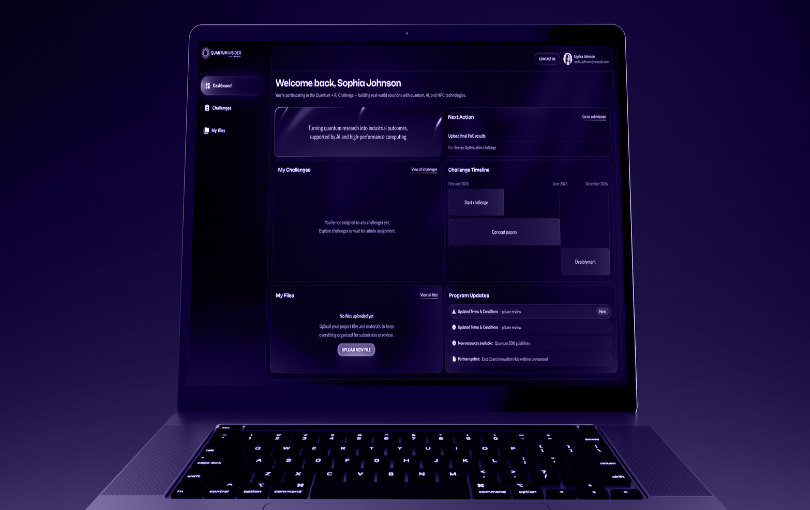 The Quantum Insider challenge dashboard on a laptop