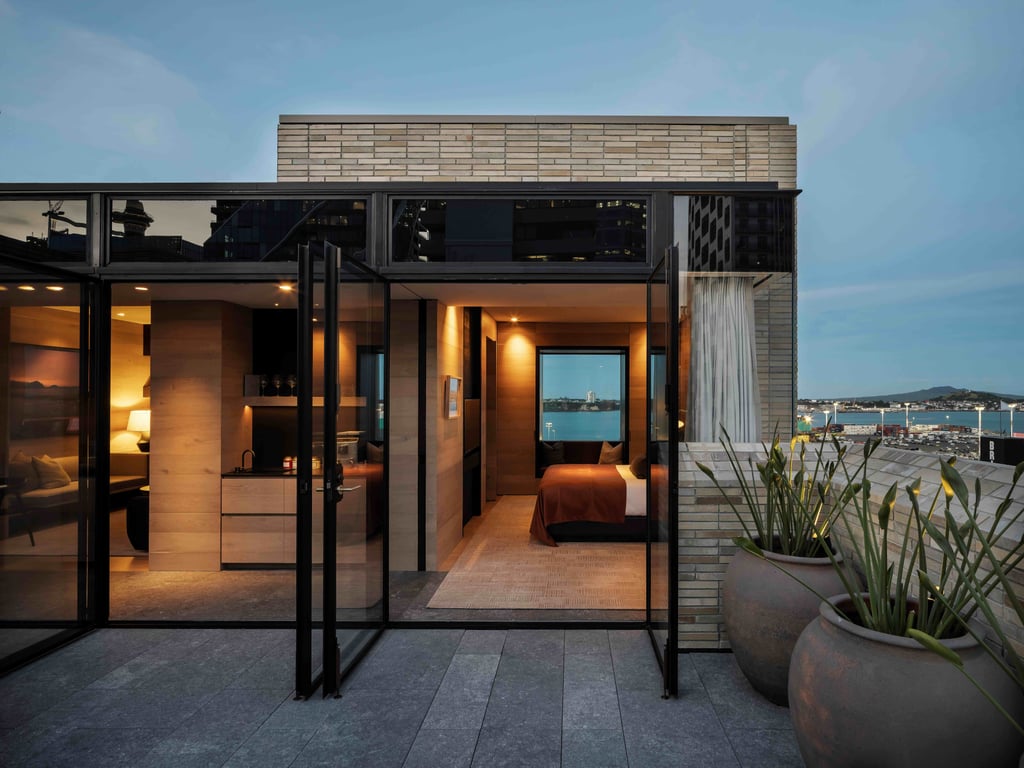 Terrace and guest room overlooking Auckland at Hotel Britomart