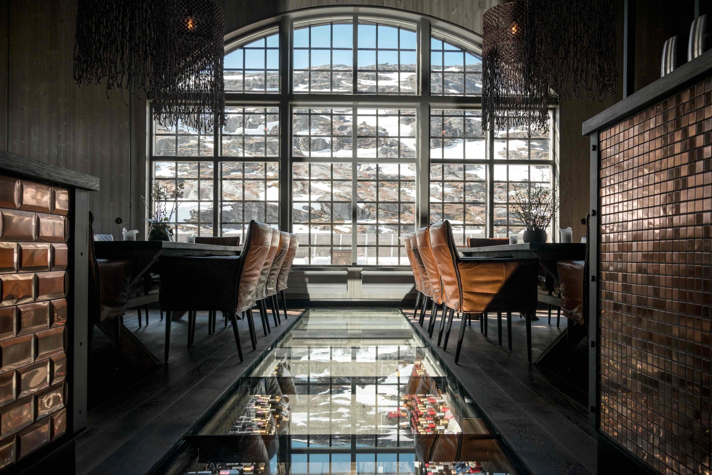 Dining room above the glass-covered wine cellar