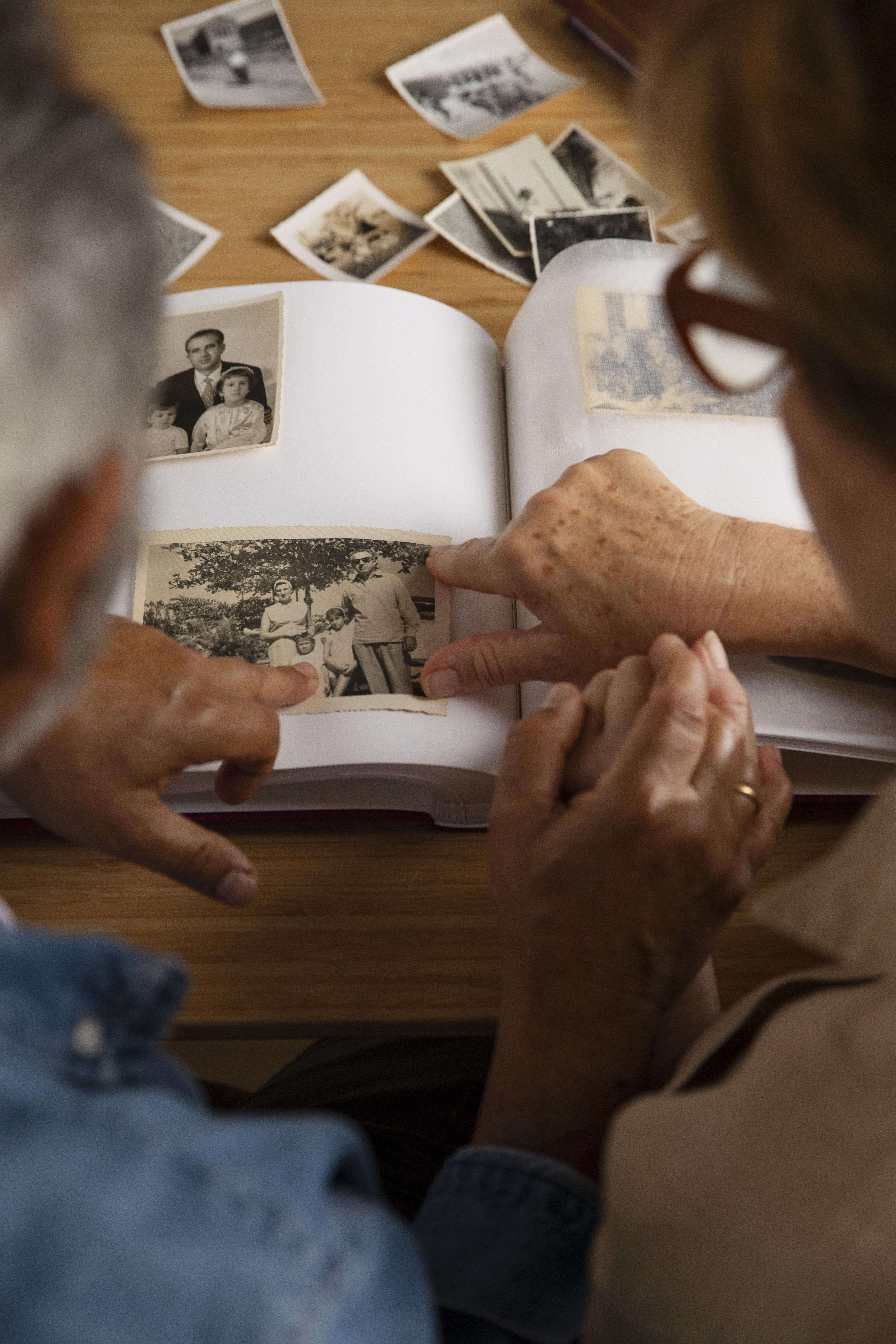 Grandparent and grandchild looking at photos