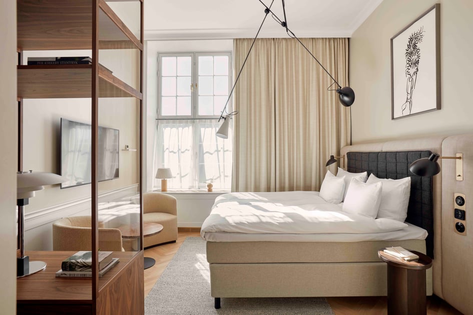 Bright Villa Copenhagen guest room with Scandinavian furnishings