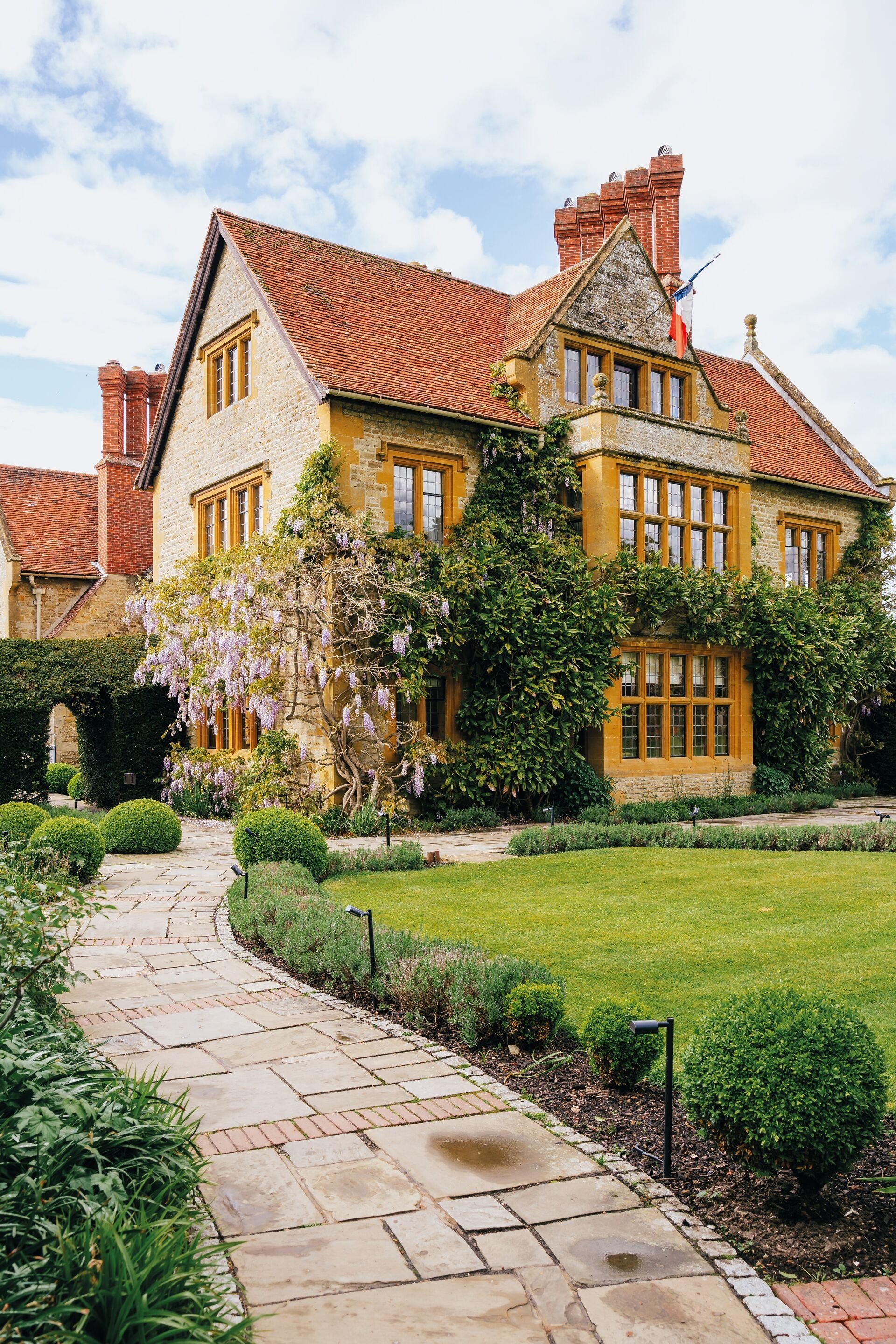 Manor house and garden path at Le Manoir aux Quat’Saisons