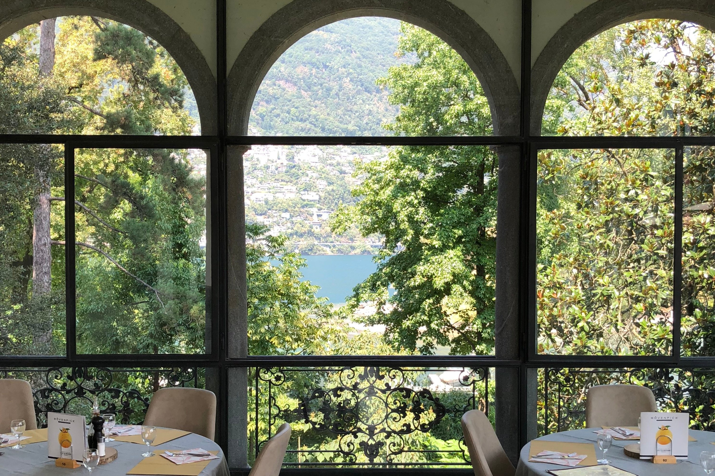Dining tables overlooking the gardens at Villa Emden