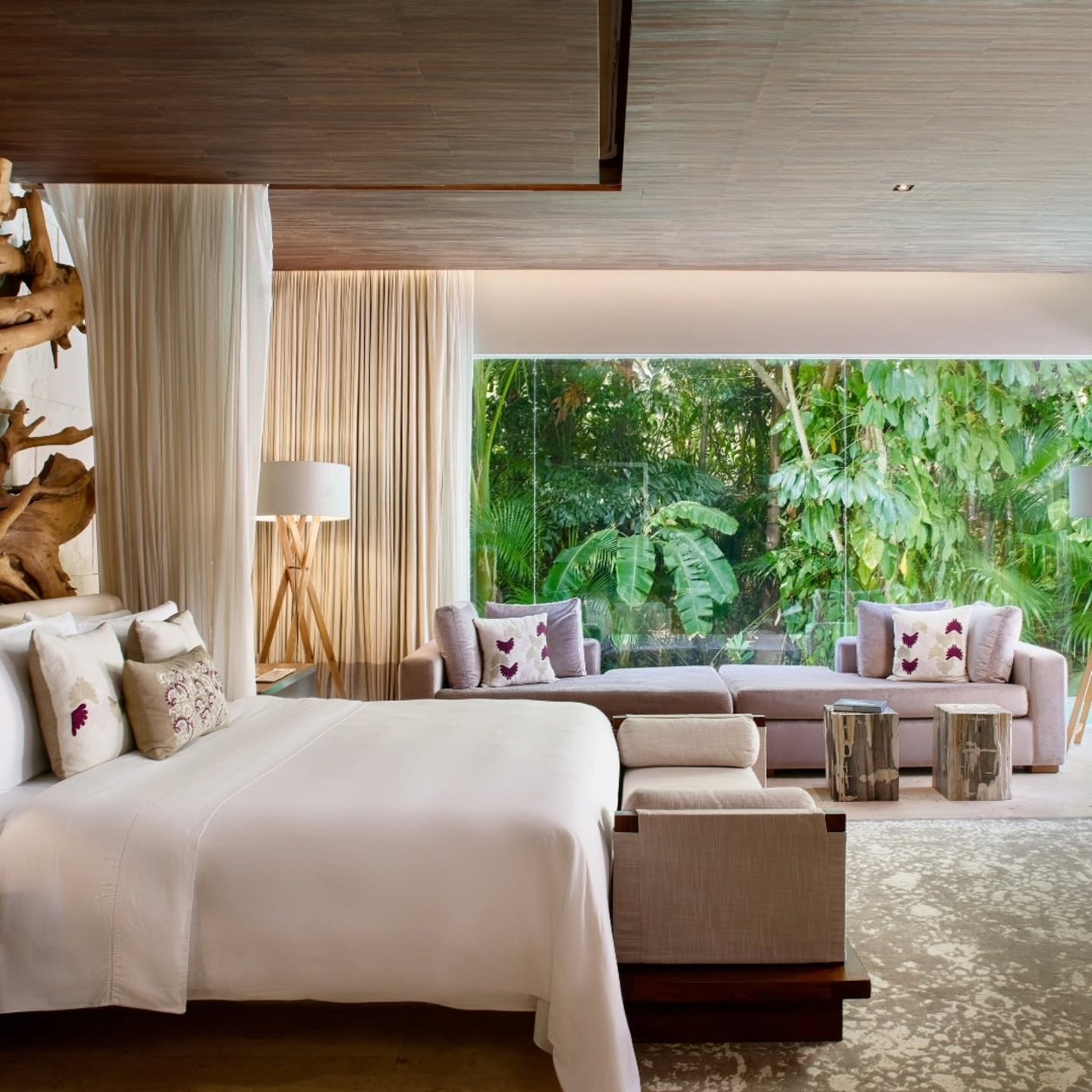 Chablé Yucatán casita bedroom opening onto dense jungle greenery