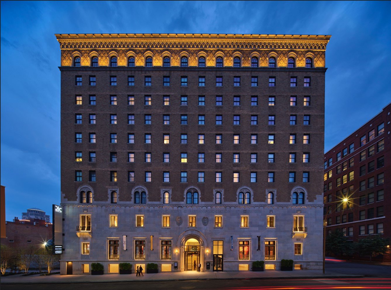 Illuminated facade of 21c Museum Hotel St. Louis at dusk