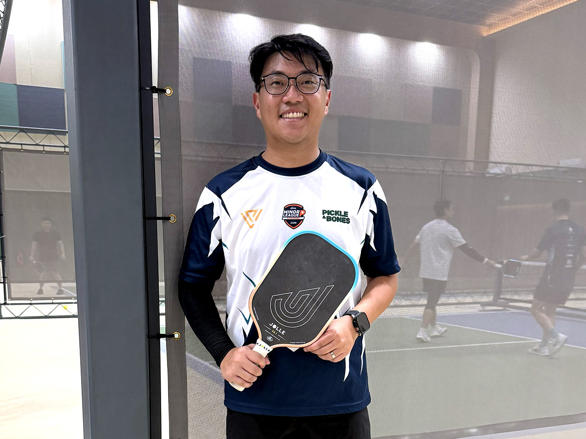 ZuoTing, looking all nice and goody before he skewers you on court (maybe we should do a feature on people who wear tournament tees...hmmm).