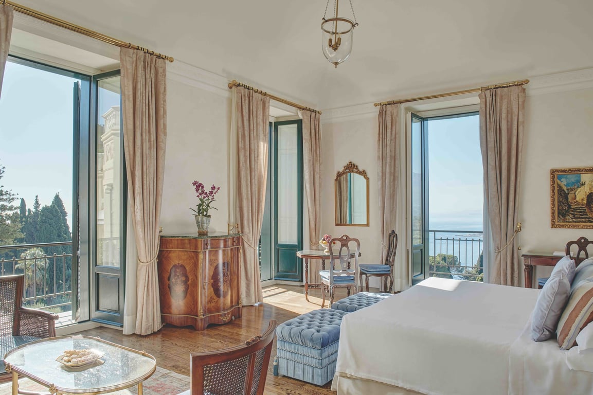 Guest room with sea views and ornate furnishings