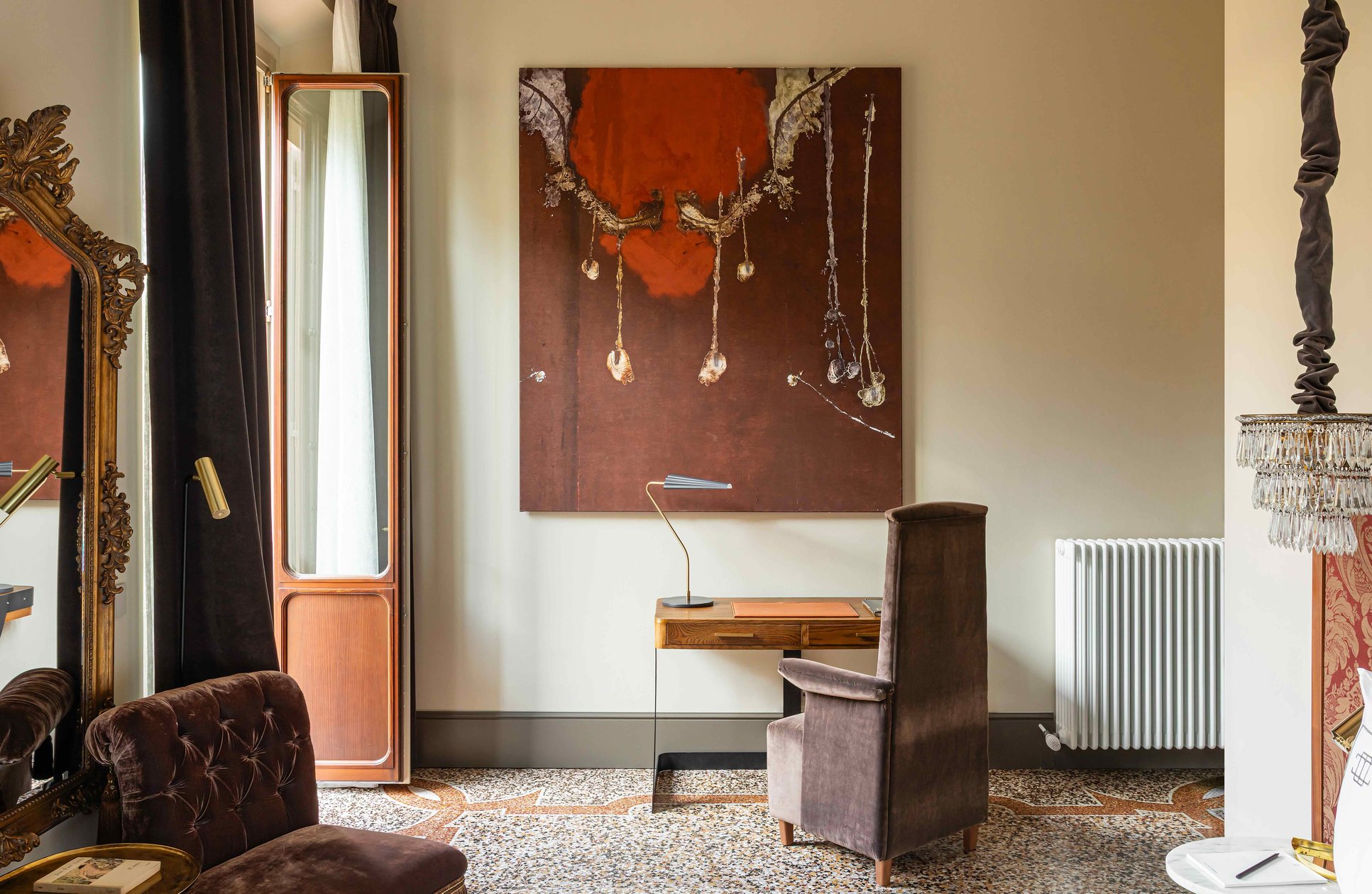 Antique piano and artwork in a This Time Tomorrow apartment