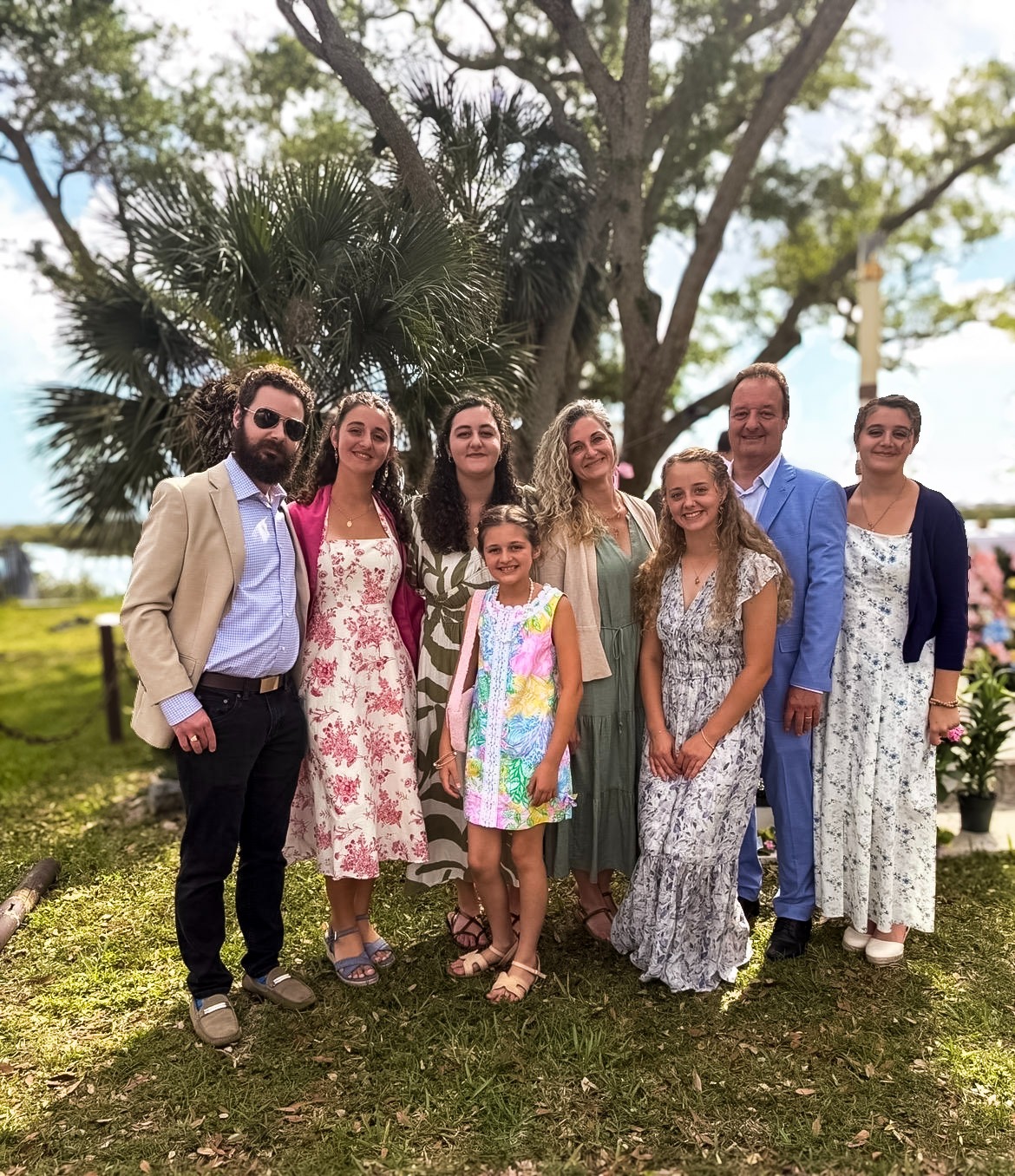 The Barbaro family together outdoors, representing family legacy and healthier money conversations