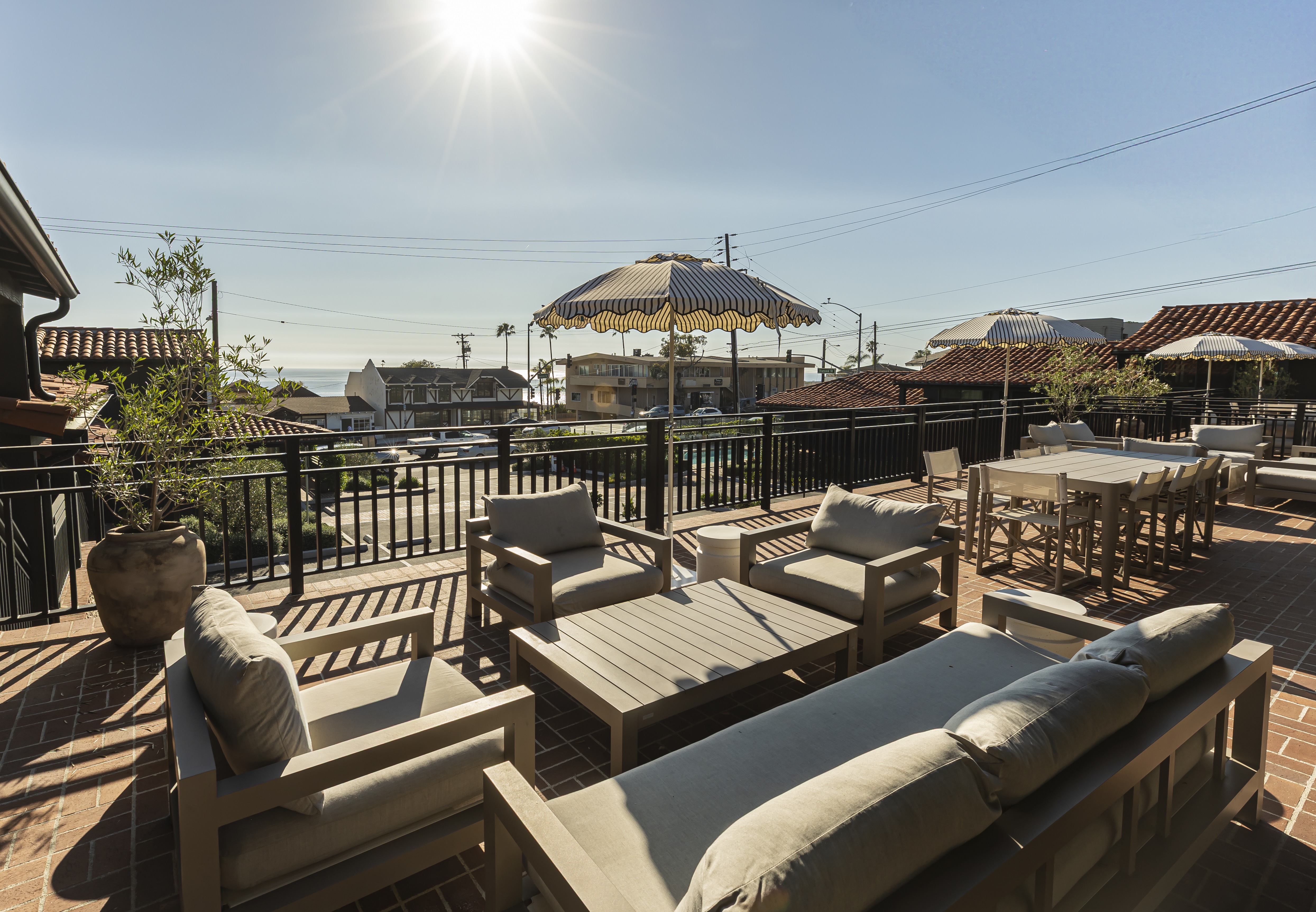 An outdoor terrace overlooking Laguna Beach at Woods Cove Inn