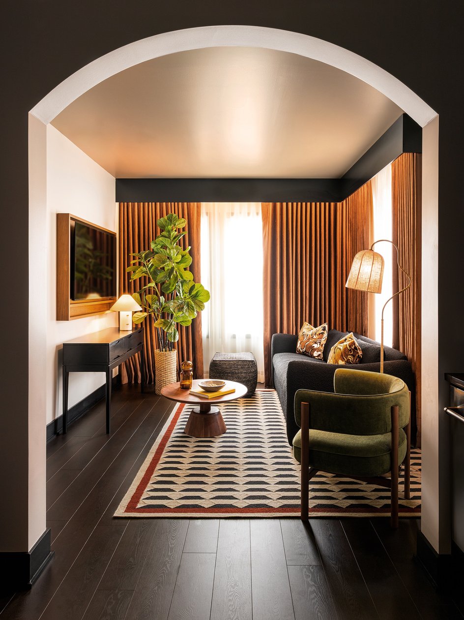 Arched sitting area with vintage-inspired furnishings at Hotel Albatross