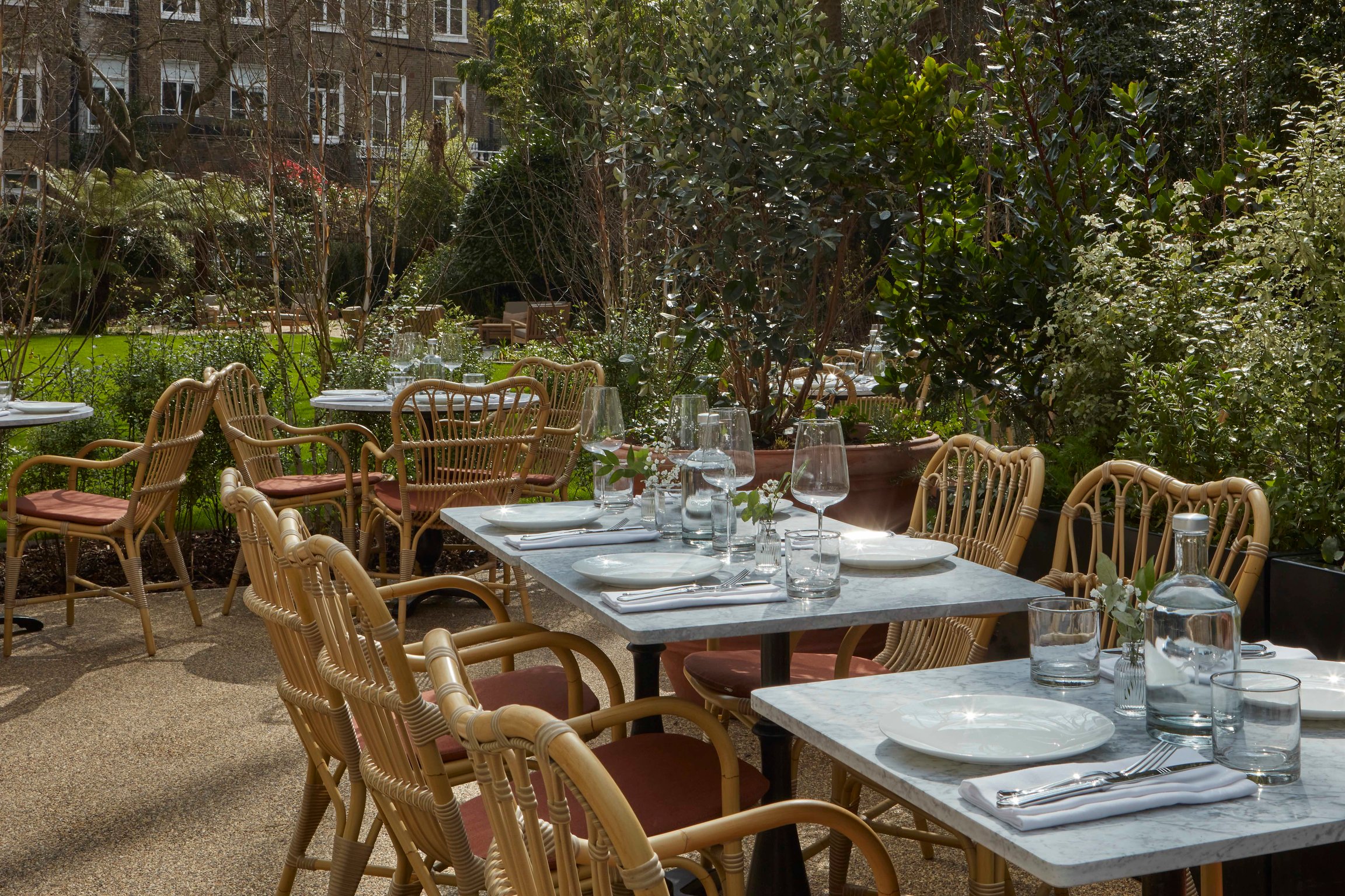 Leafy garden dining terrace at Templeton Garden