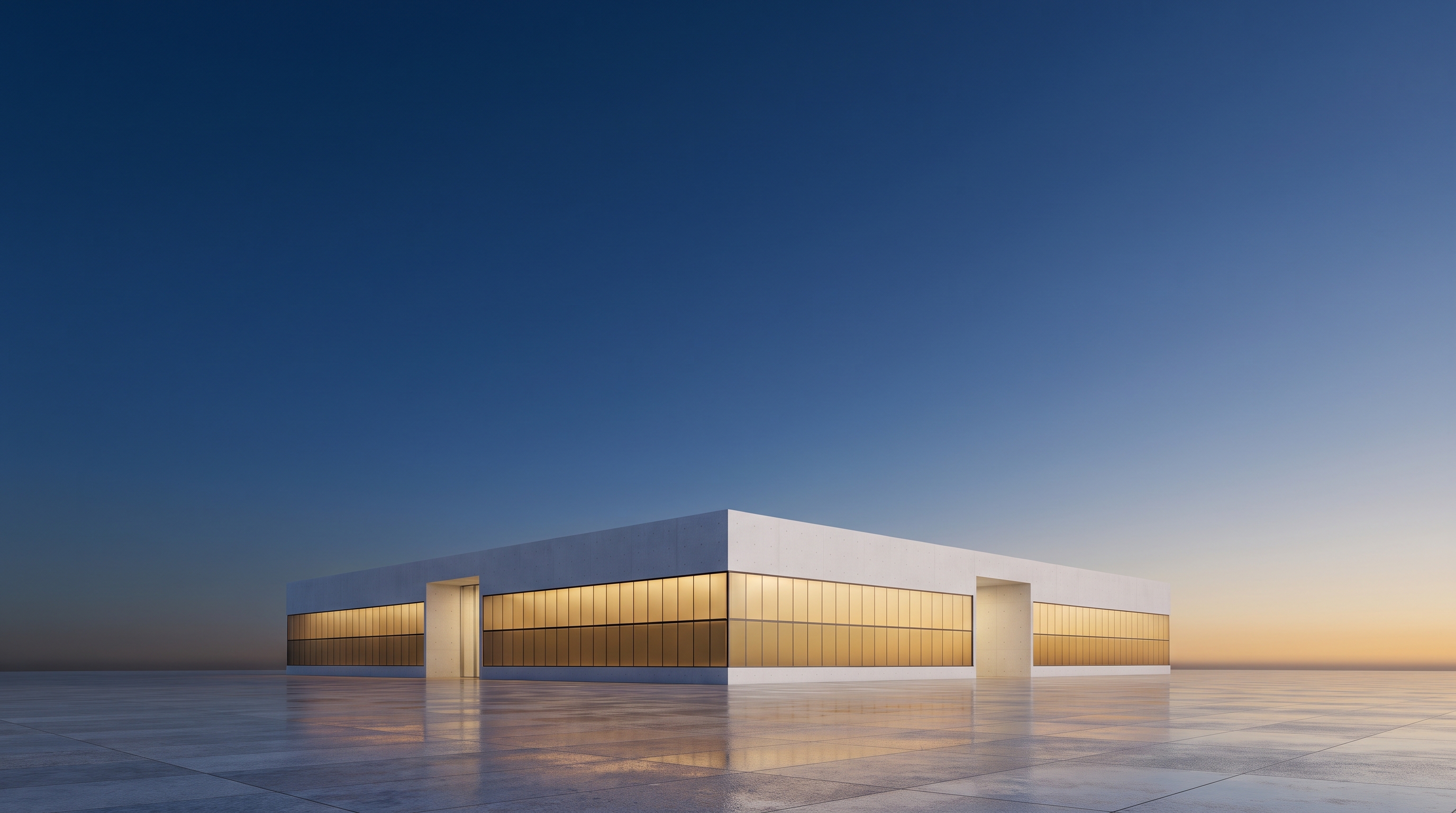 A single sleek white data center building glowing warmly from within at blue hour under a wide navy and gold sky