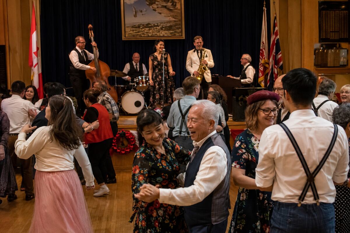 A lively dance band performing for an anniversary celebration in a Steveston community hall