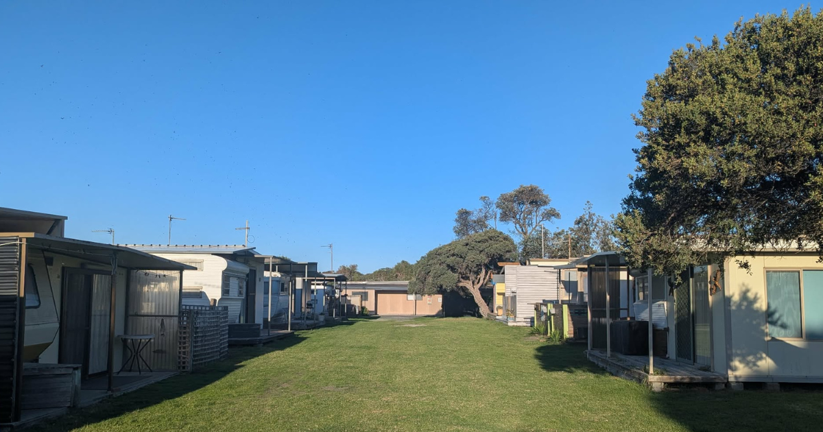 End of an era for modest Sandy Point caravan park, as 11 new townhouses ...