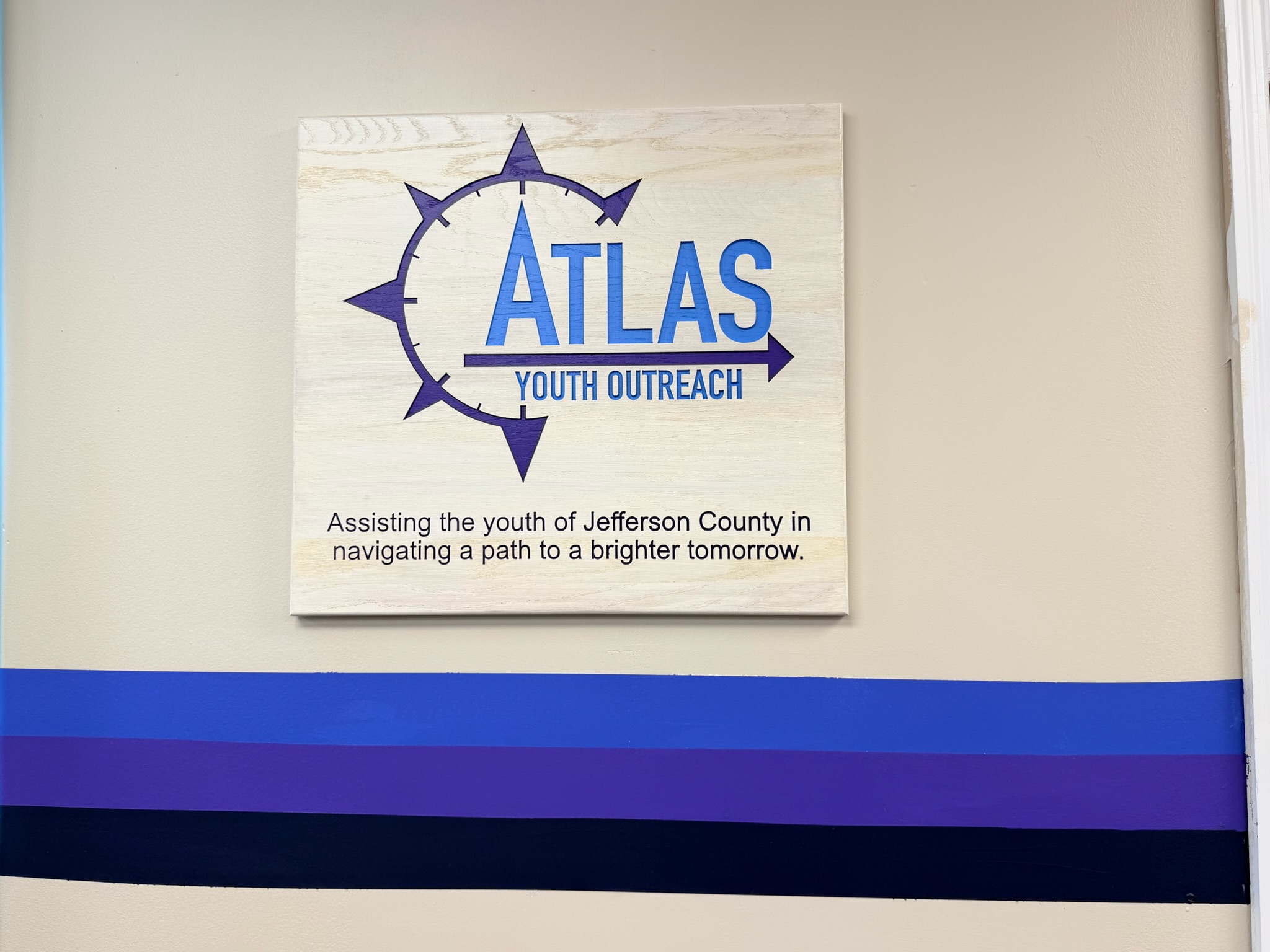 Atlas Youth Outreach mission statement sign