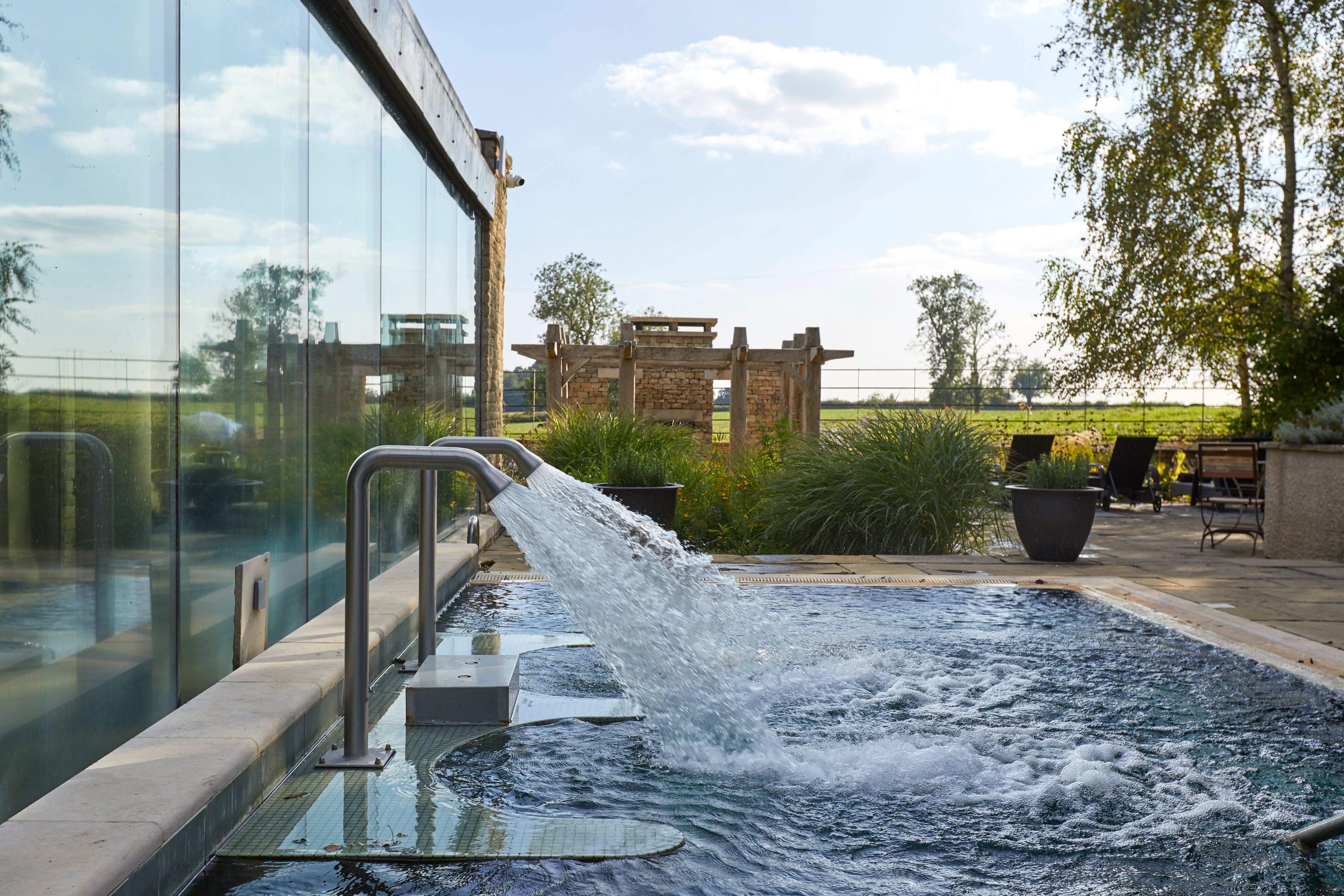Outdoor hydrotherapy pool at The Pig’s Fieldhouse spa
