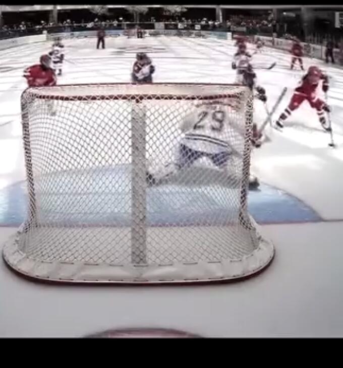 On-ice action — an HPC member scoring