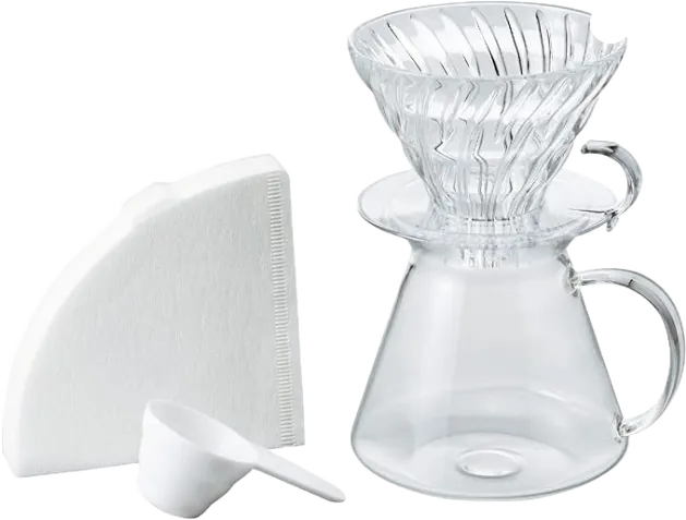 Hario V60 glass dripper and server with paper filters and a scoop