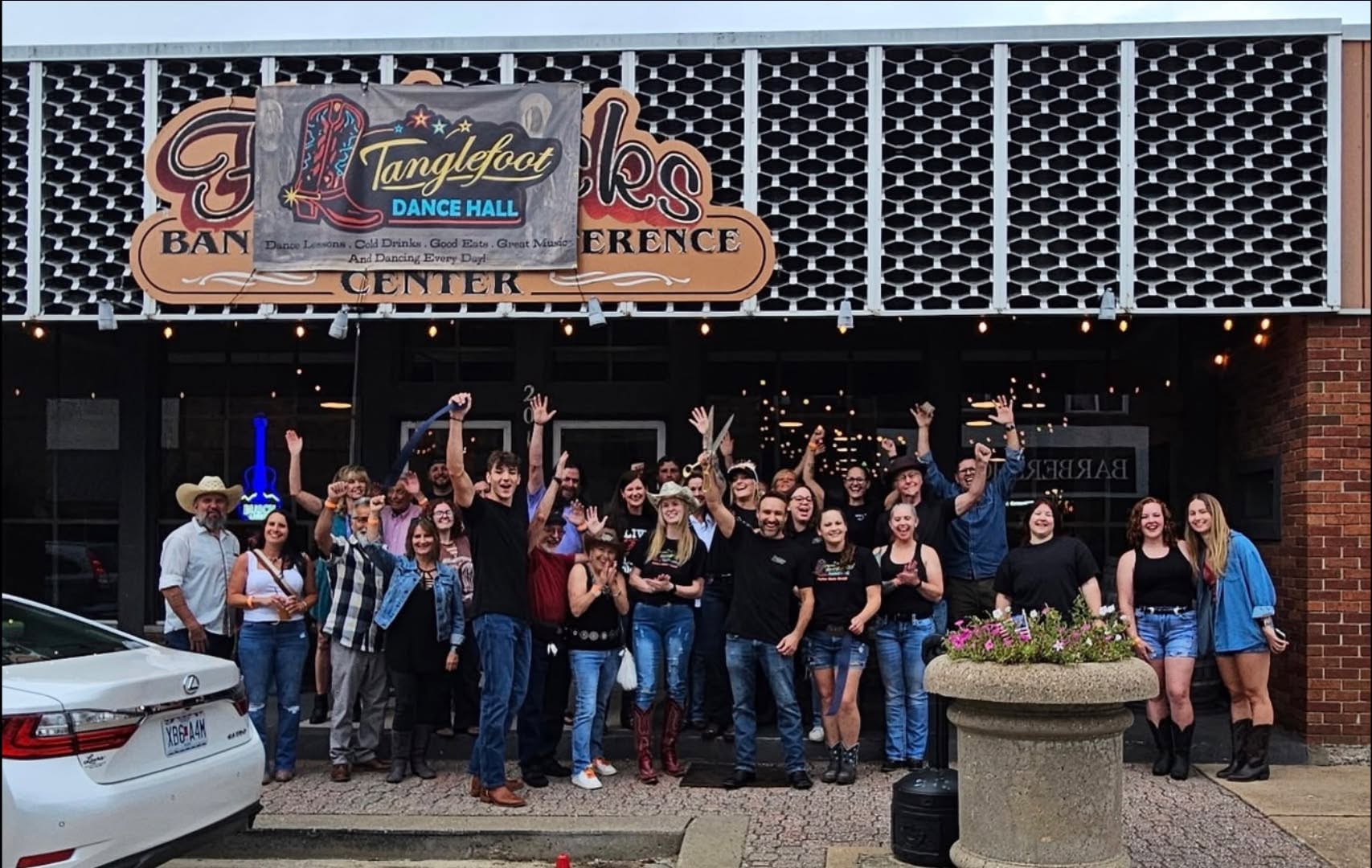 Crowd gathered for Tanglefoot Dance Hall's grand opening in downtown Festus