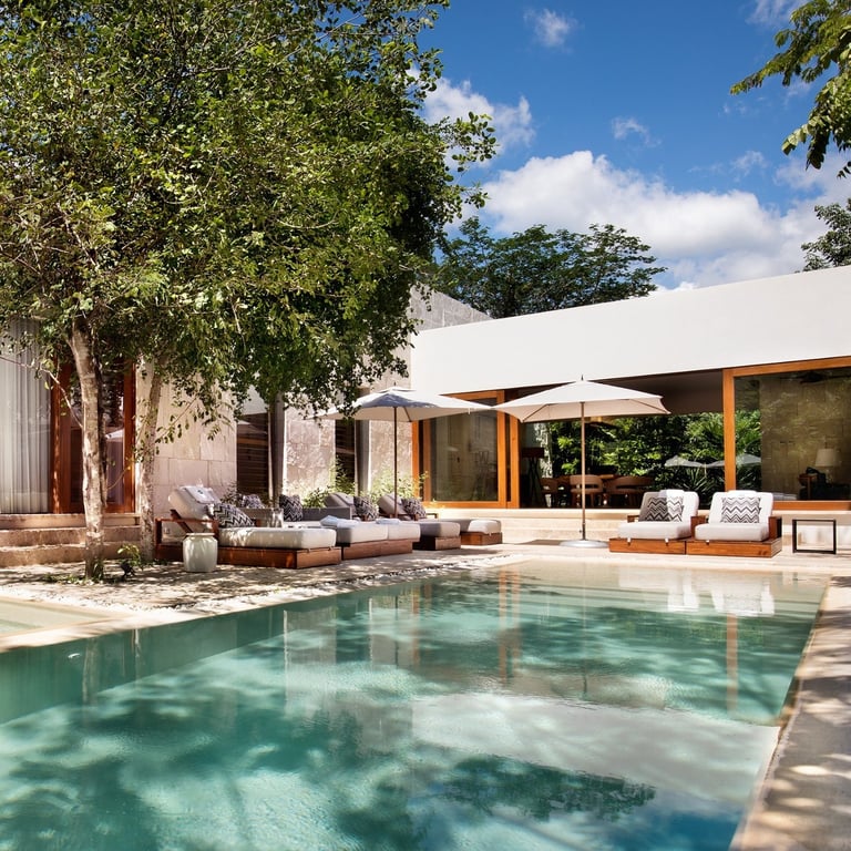 Private casita and plunge pool surrounded by tropical trees at Chablé Yucatán