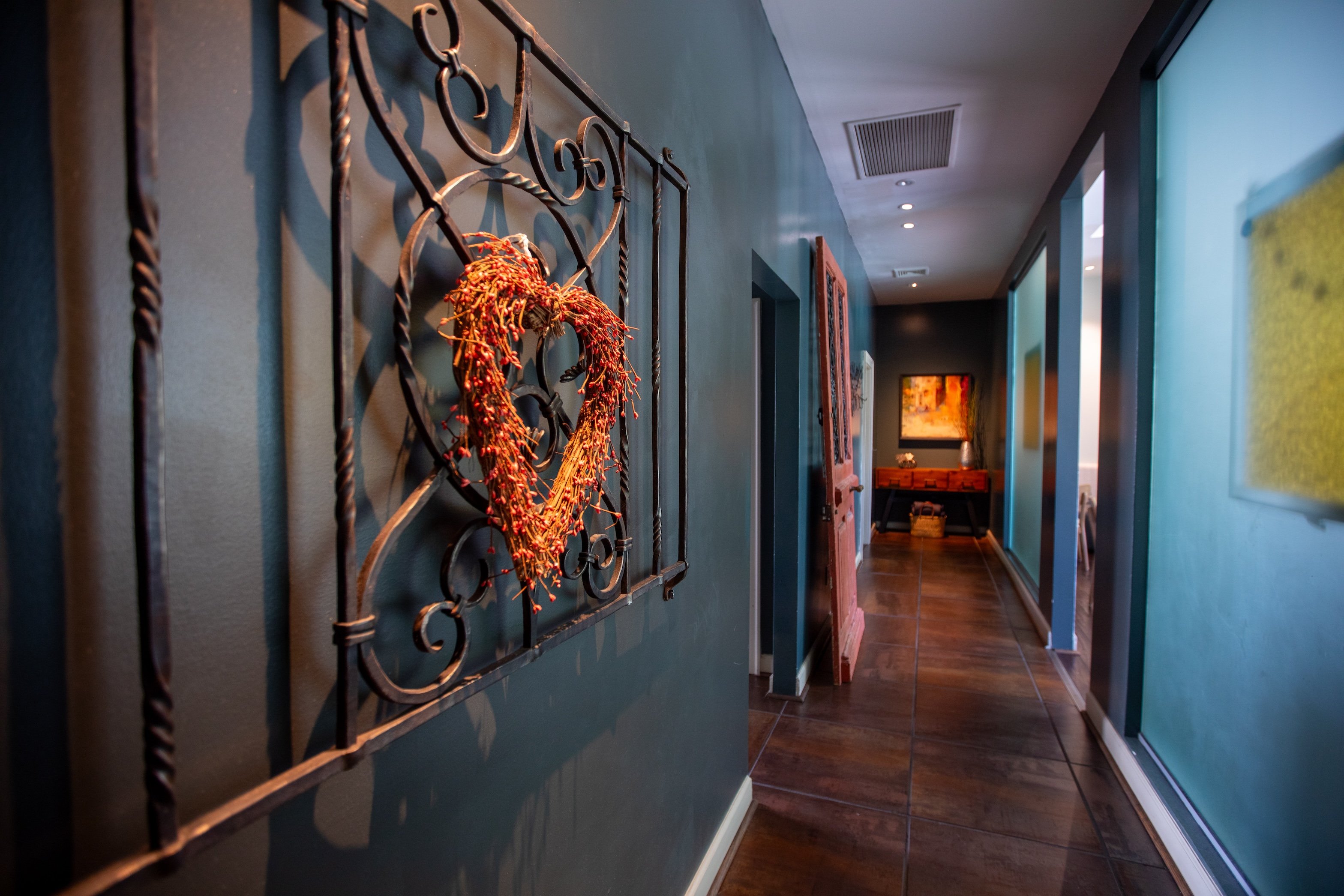 Blue-painted corridor at The Blue Door Inn