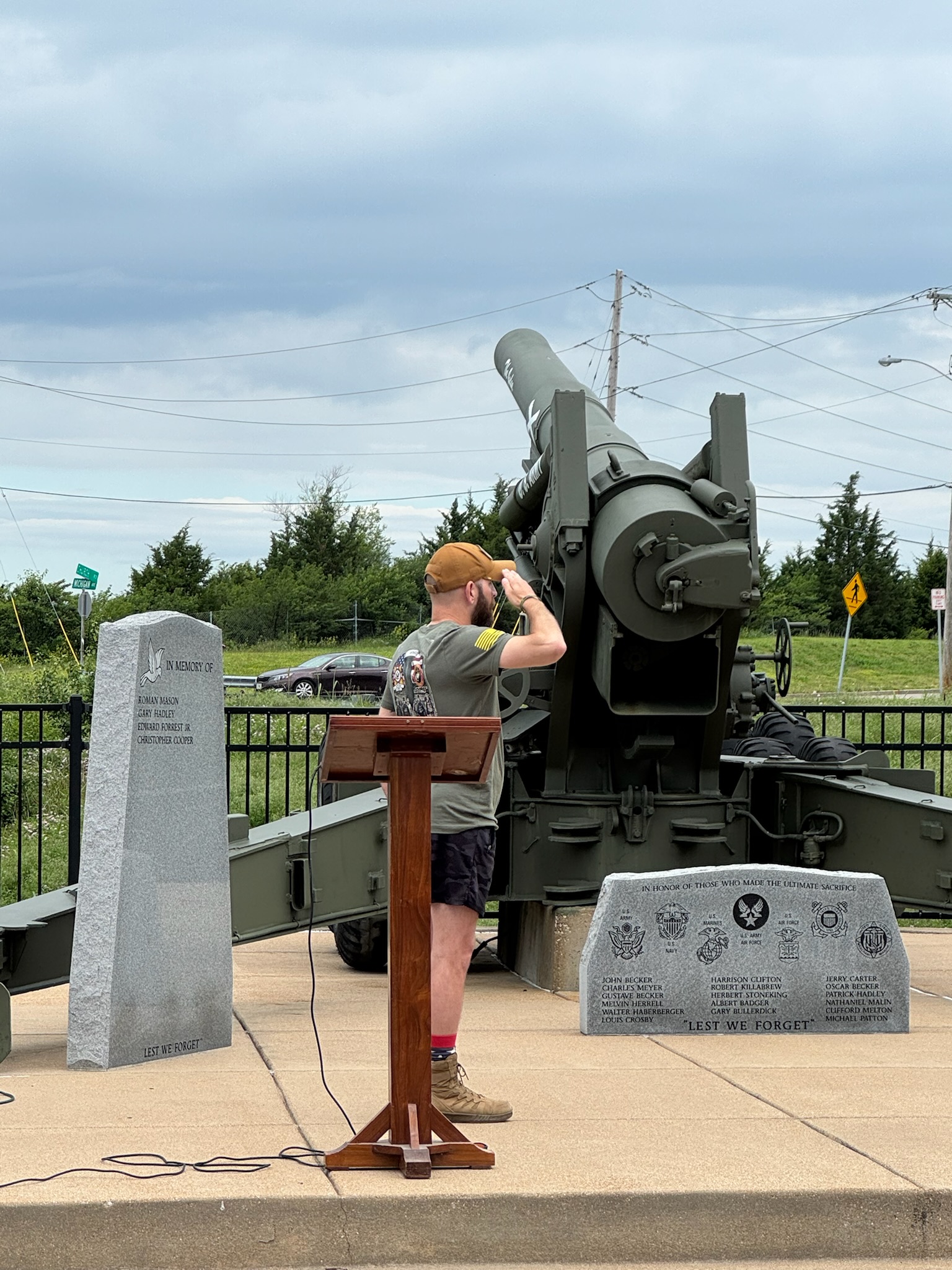 Matt Saller salutes during the opening tribute at the Arnold VFW