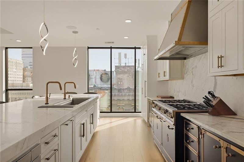 The kitchen at 350 Oliver Avenue, with its eight-burner Italian range
