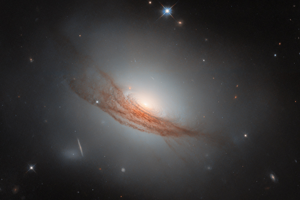 Another gorgeous Hubble galaxy, but it has many secrets
