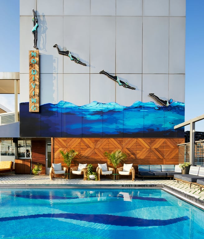 Heated rooftop pool and diving mural at Gansevoort Meatpacking
