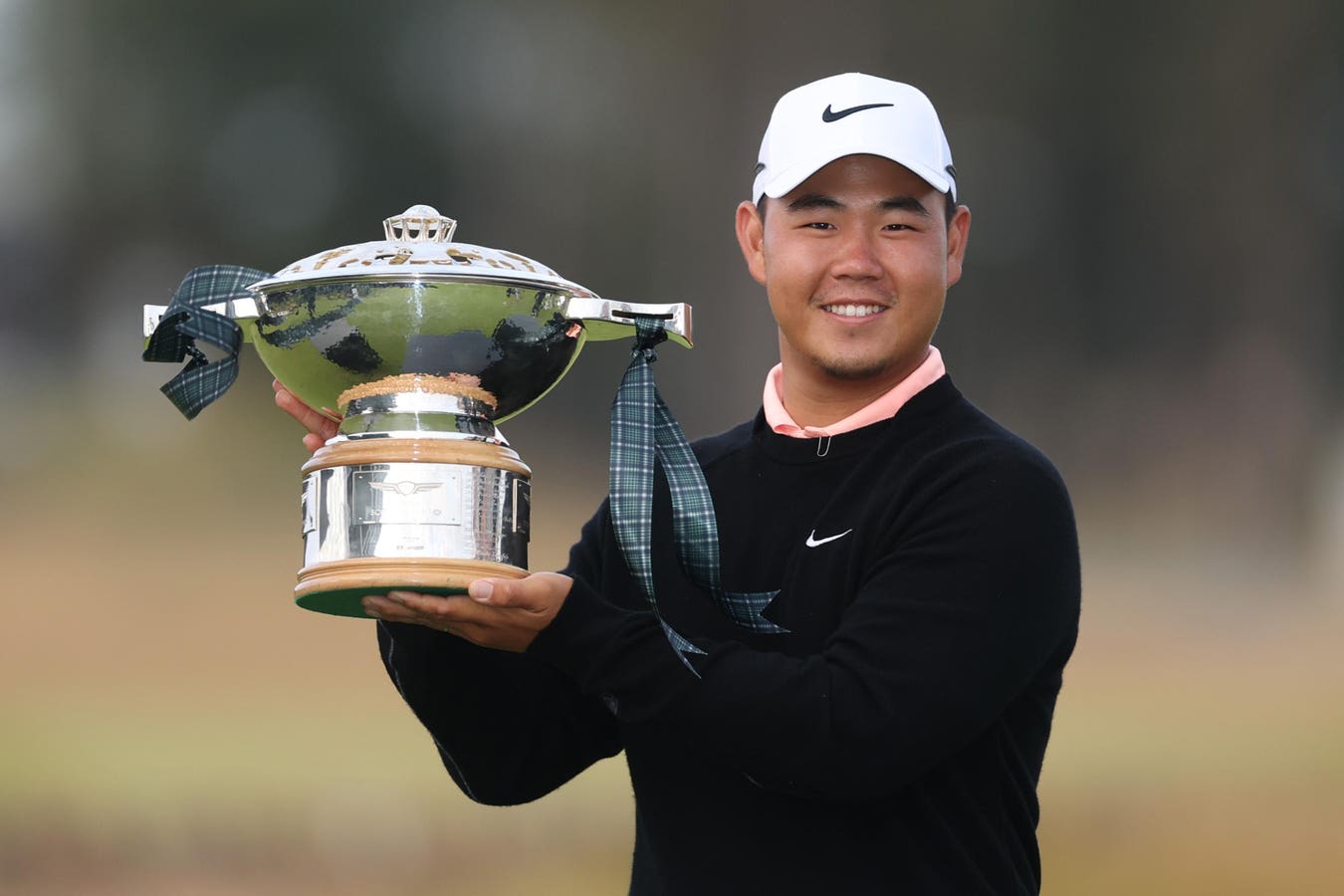 Tom Kim lifts the Genesis Scottish Open trophy
