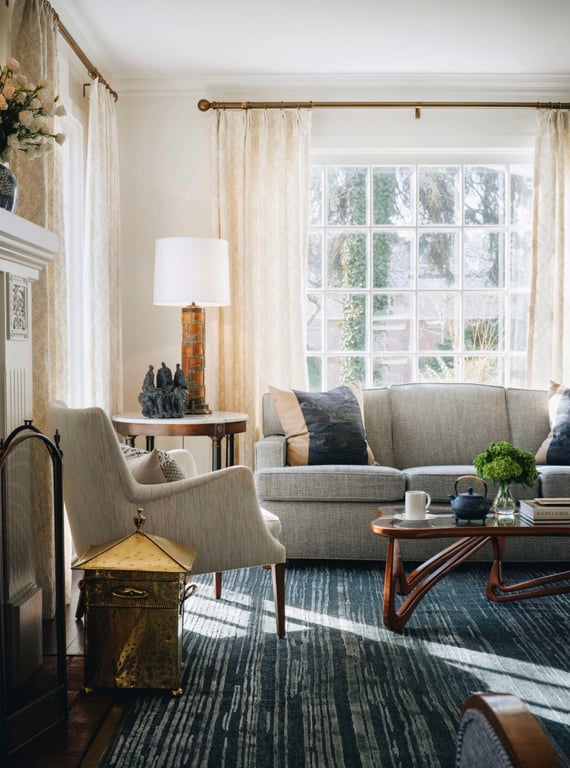 Bright living room with patterned rugs at Wickwood Inn