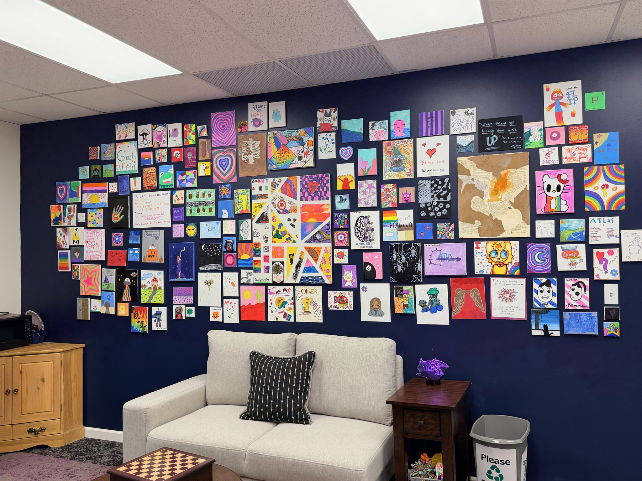 Atlas Youth Outreach wall art and seating area