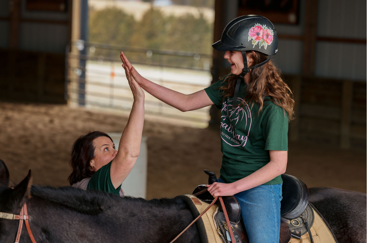Gaitway to Her Success participant with a horse