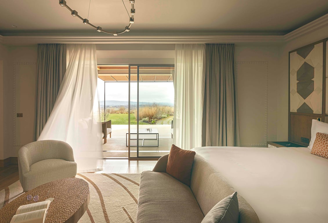 Guest room overlooking the Tuscan countryside at Castelfalfi
