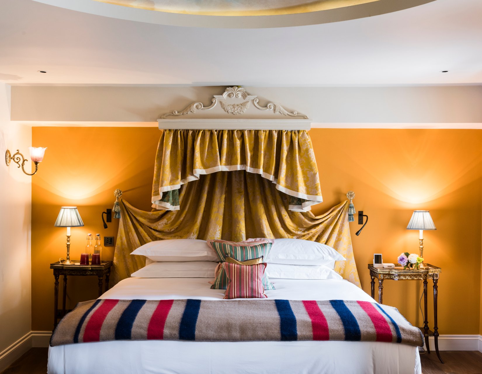 Canopied bed and colorful textiles at The Zetter Marylebone