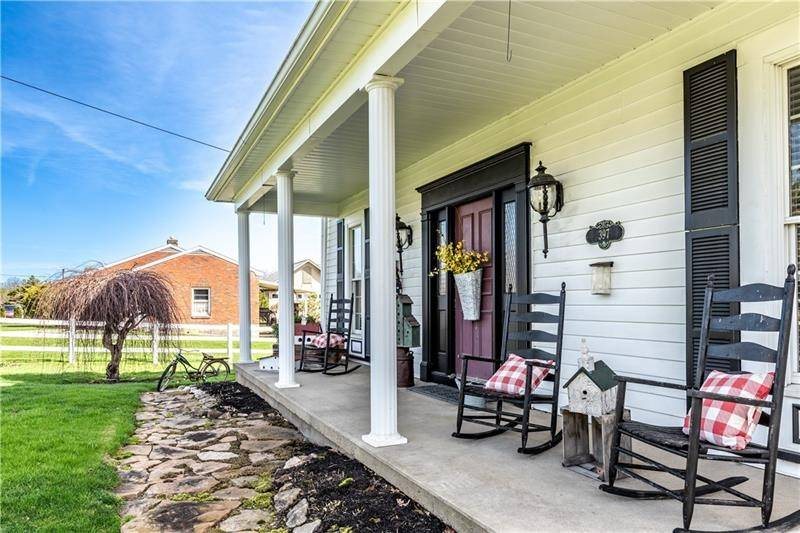 Rocking chairs on the front porch at 397 Evans City Road