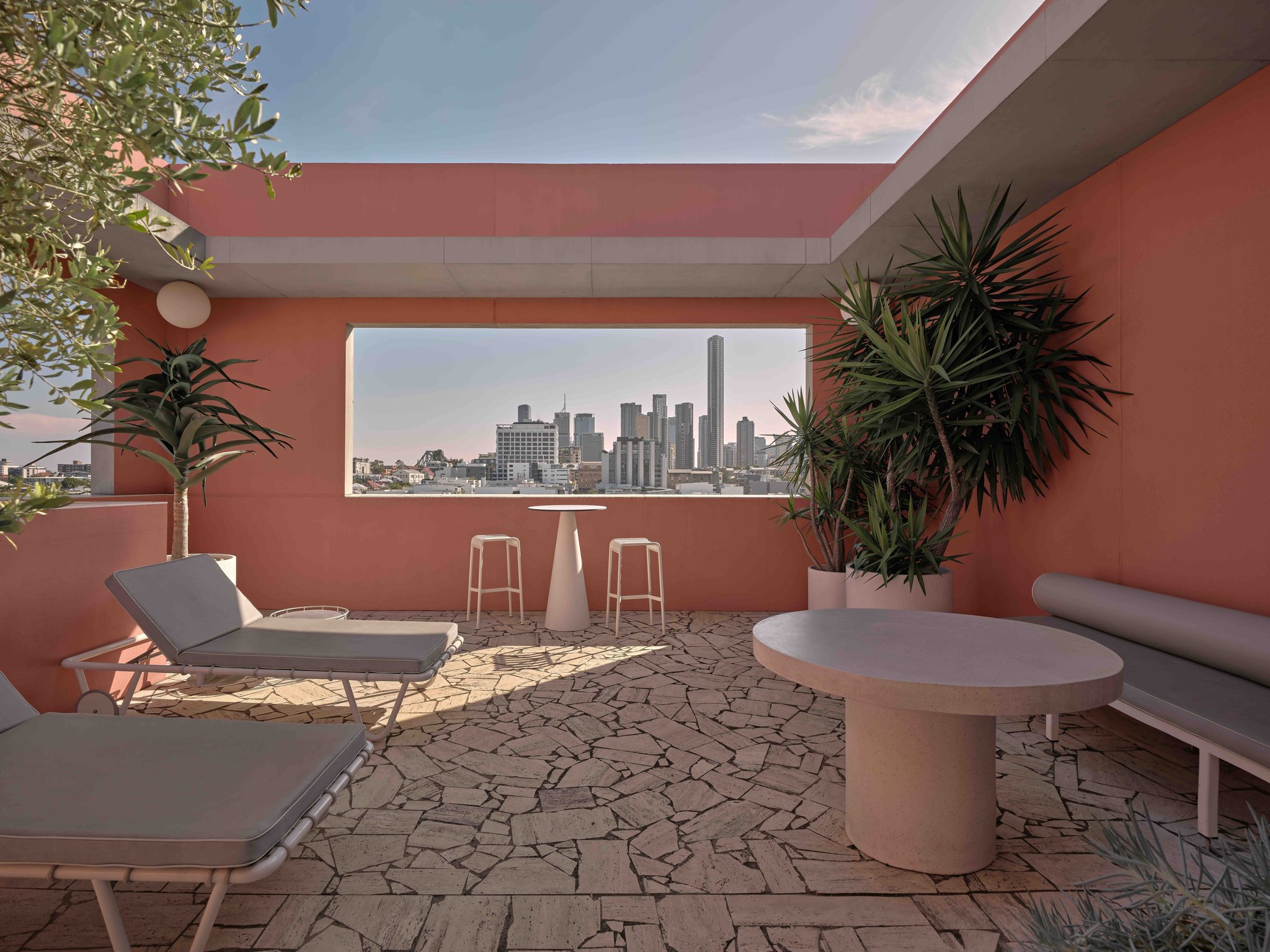 Pink private terrace overlooking the Brisbane skyline