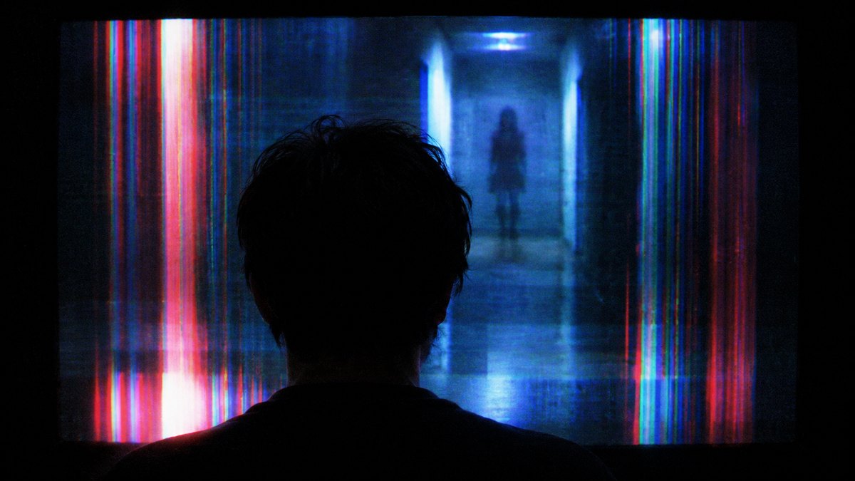 Silhouettes of people in a haunted house attraction
